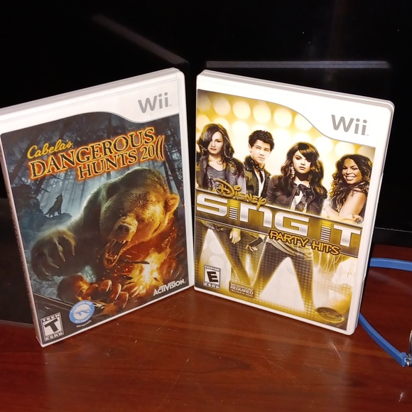 Nintendo Wii Video Games (2), Aux Cord, & Nerf Racing Wheel- PRE-OWNED - Picture 2 of 7